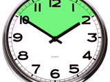 A clock with a section of time highlighted.  