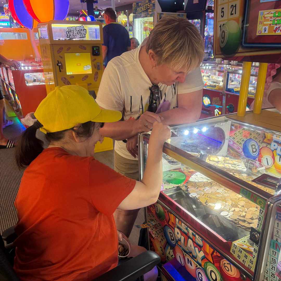 An image picturing Liz in an amusement arcade