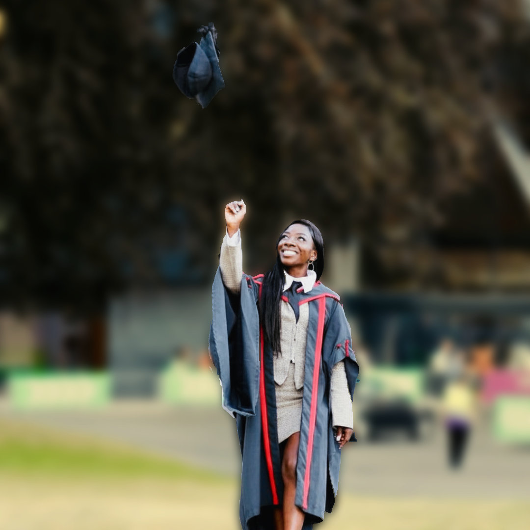 An image picturing Jennifer throwing her mortarboard hat into the air.