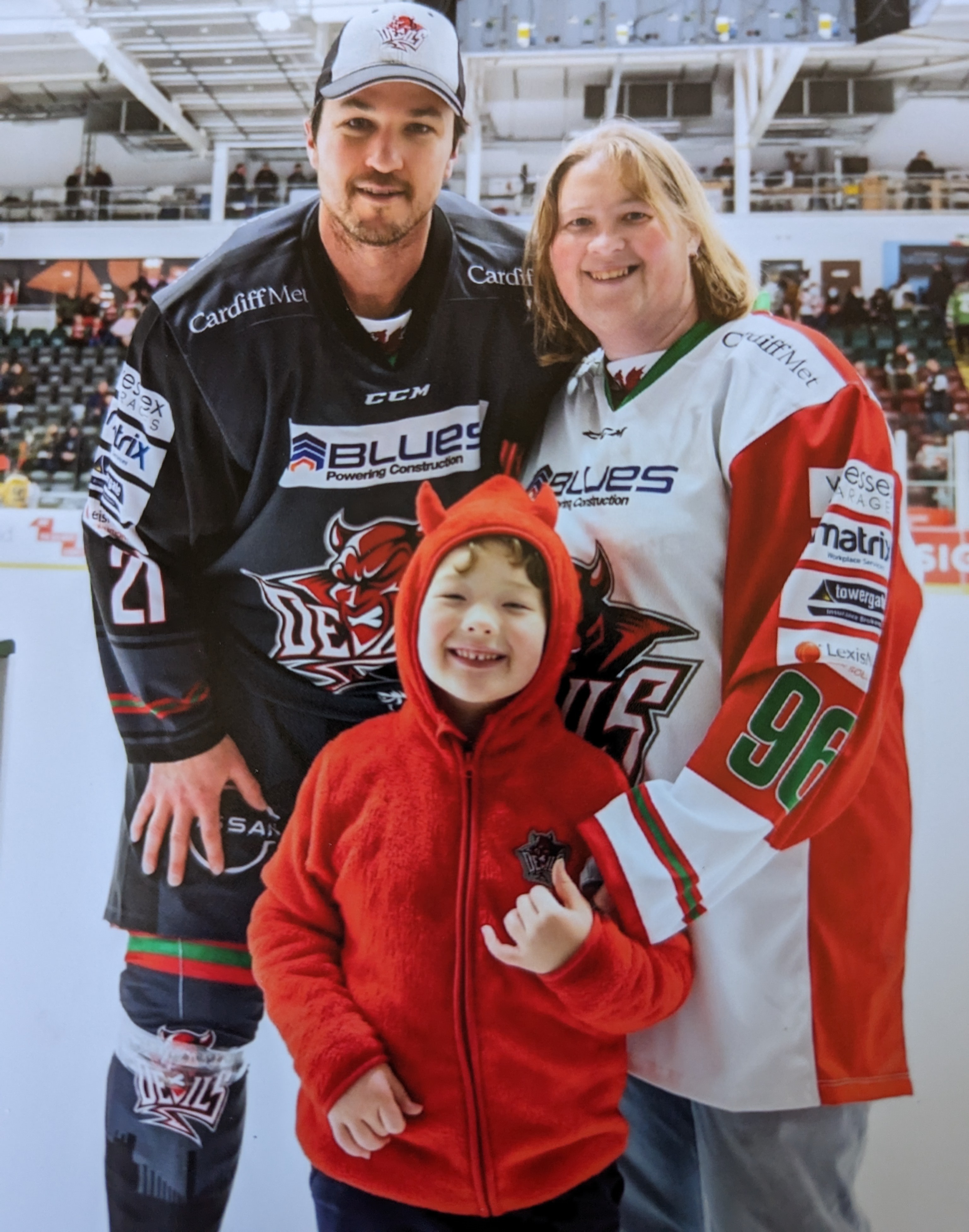 Cardiff Devil's player, Brodie Reid, with Sarah and Tom.
