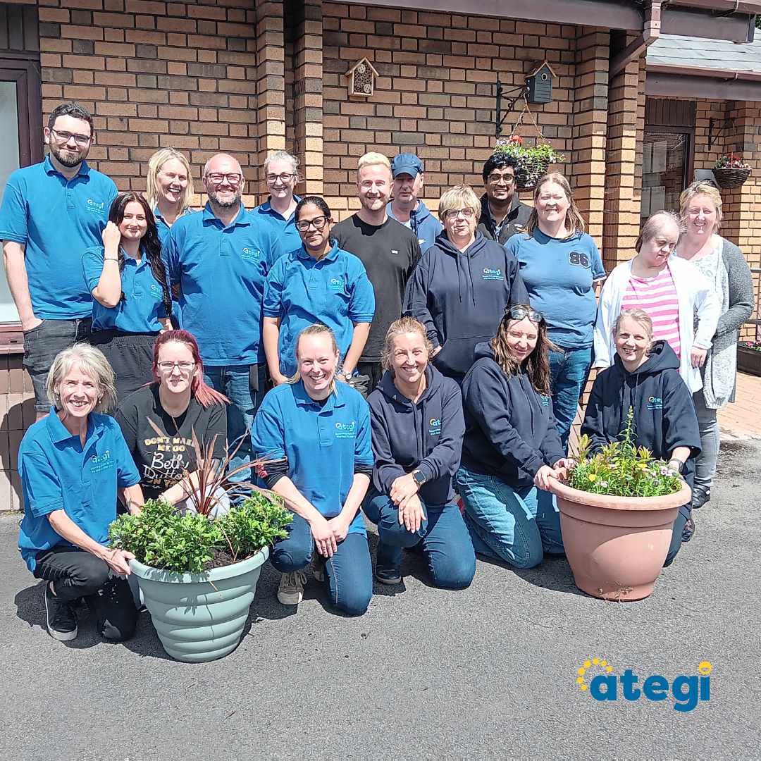 A group photo of Ategi colleagues and people we support