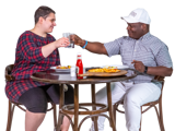 Two people having a meal together and raising their glasses.  